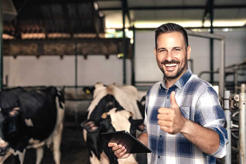 Here's a happy dairy worker!