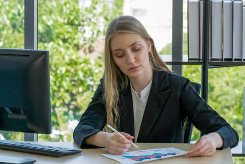 Office worker preparing a proposal